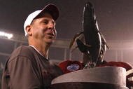 SAN DIEGO - DECEMBER 30: Head Coach Bo Pelini of the University of Nebraska Cornhuskers receives the trophy after defeating the University of Arizona Wildcats in the Pacific Life Holiday Bowl on December 30, 2009 at Qualcomm Stadium in San Diego, California. The Cornhuskers defeated the Wildcats 33-0. (Photo By Donald Miralle/Getty Images)