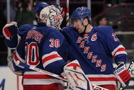 NEW YORK - FEBRUARY 06: Henrik Lundqvist #30 of the New York Rangers is congratulated by team mate Chris Drury #23 after defeating the New Jersey Devils during their game on February 6, 2010 at Madison Square Garden in New York City. (Photo by Chris McGrath/Getty Images)