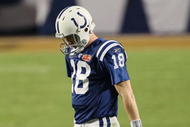 MIAMI GARDENS, FL - FEBRUARY 07: Peyton Manning #18 of the Indianapolis Colts walks on the field against the New Orleans Saints during Super Bowl XLIV on February 7, 2010 at Sun Life Stadium in Miami Gardens, Florida. (Photo by Jed Jacobsohn/Getty Images)