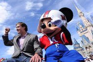 LAKE BUENA VISTA, FL - FEBRUARY 08:  In this handout photo provided by Disney, Super Bowl XLIV MVP Drew Brees joins Mickey Mouse in a celebratory parade in the Magic Kingdom on February 8, 2010 in Lake Buena Vista, Florida.  Brees, the quarterback of the New Orleans Saints, is the latest celebrity to star in the 'I'm Going to Disney World!' and 'I'm Going to Disneyland' commercials which aired only hours after last night's NFL championship game ended.  Brees led his team to a 31-17 victory over the AFC champion Indianapolis Colts in Super Bowl XLIV in Miami.  (Photo by David Roark/Disney via Getty Images)