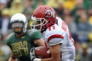 EUGENE, OR - SEPTEMBER 19: Luke Matthews #11 of the Utah Utes eludes a tackle as he runs back a punt in the 1st quarter of the game against the Oregon Ducks at Autzen Stadium on September 19, 2009 in Eugene, Oregon. Oregon won the game 31-24. (Photo by Steve Dykes/Getty Images)