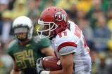 EUGENE, OR - SEPTEMBER 19: Luke Matthews #11 of the Utah Utes eludes a tackle as he runs back a punt in the 1st quarter of the game against the Oregon Ducks at Autzen Stadium on September 19, 2009 in Eugene, Oregon. Oregon won the game 31-24. (Photo by Steve Dykes/Getty Images)