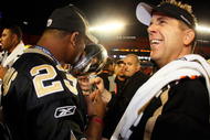 MIAMI GARDENS, FL - FEBRUARY 07: Head coach Sean Payton of the New Orleans Saints celebrates with the Vince Lombardi Trophy after defeating the Indianapolis Colts during Super Bowl XLIV on February 7, 2010 at Sun Life Stadium in Miami Gardens, Florida. (Photo by Donald Miralle/Getty Images)