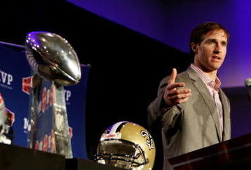 FORT LAUDERDALE, FL - FEBRUARY 08:  Most Valuable Player of Super Bowl XLIV, quarterback Drew Brees #9 of the New Orleans Saints speaks during the Super Bowl Champion Coach Press Conference at the Fort Lauderdale Convention Center on February 8, 2010 in Fort Lauderdale, Florida.  (Photo by Doug Benc/Getty Images)