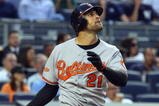 NEW YORK - JULY 20:  Nick Markakis #21 of the Baltimore Orioles bats against the New York Yankees on July 20, 2009 at Yankee Stadium in the Bronx borough of New York City.  (Photo by Jim McIsaac/Getty Images)