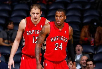 ATLANTA - DECEMBER 02:  Sonny Weems #24 and Rasho Nesterovic #12 of the Toronto Raptors against the Atlanta Hawks at Philips Arena on December 2, 2009 in Atlanta, Georgia.  NOTE TO USER: User expressly acknowledges and agrees that, by downloading and/or using this Photograph, User is consenting to the terms and conditions of the Getty Images License Agreement.  (Photo by Kevin C. Cox/Getty Images)