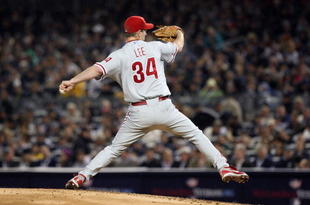 NEW YORK - OCTOBER 28:  Cliff Lee #34 of the Philadelphia Phillies throws a pitch against the New York Yankees in Game One of the 2009 MLB World Series at Yankee Stadium on October 28, 2009 in the Bronx borough of New York City.  (Photo by Jed Jacobsohn/Getty Images)