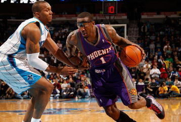 NEW ORLEANS - FEBRUARY 01:  Amar'e Stoudemire #1 of the Phoenix Suns drives the ball around David West #30 of the New Orleans Hornets at the New Orleans Arena on February 1, 2010 in New Orleans, Louisiana.  The Suns defeated the Hornets 109-100.  NOTE TO USER: User expressly acknowledges and agrees that, by downloading and/or using this Photograph, User is consenting to the terms and conditions of the Getty Images License Agreement.  (Photo by Chris Graythen/Getty Images)