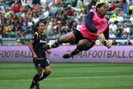 CARSON, CA - MARCH 29:  Marta #10 of the Los Angeles Sol reacts as the ball goes in the net for a goal by teammate Camille Abily #20 (not in photo) as goalkeeper Briana Scurry #1 of the Washington Freedom fails to make the save in the second half during their inaugural WPS match at The Home Depot Center on March 29, 2009 in Carson, California.  The Sol defeated the Freedom 2-0.  (Photo by Victor Decolongon/Getty Images)