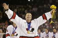 SALT LAKE CITY - FEBRUARY 24: Goaltender Martin Brodeur #30 of Canada smiles as he skates with his gold medal around his neck after the game against the USA in the men's ice hockey gold medal game at the 2002 Salt Lake City Winter Olympic Games on February 24, 2002 at the E Center in Salt Lake City, Utah. Canada defeated the USA 5-2. (Photo by Brian Bahr/Getty Images)