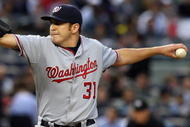 NEW YORK - JUNE 17: John Lannan #31 of the Washington Nationals deals a pitch against the New York Yankees on June 17, 2009 at Yankee Stadium in the Bronx borough of New York City. (Photo by Jim McIsaac/Getty Images)