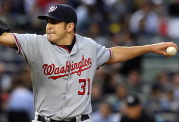 NEW YORK - JUNE 17:  John Lannan #31 of the Washington Nationals deals a pitch against the New York Yankees on June 17, 2009 at Yankee Stadium in the Bronx borough of New York City.  (Photo by Jim McIsaac/Getty Images)