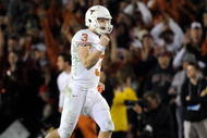 PASADENA, CA - JANUARY 07:  Quarterback Garrett Gilbert #3 of the Texas Longhorns celebrates after wide receiver Jordan Shipley #8 scores a 28-yard touchdown against the Alabama Crimson Tide during the fourth quarter of the Citi BCS National Championship game at the Rose Bowl on January 7, 2010 in Pasadena, California.  (Photo by Kevork Djansezian/Getty Images)