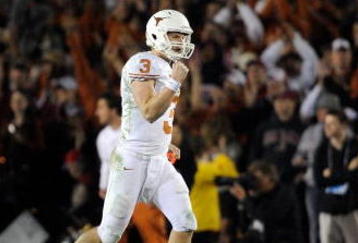PASADENA, CA - JANUARY 07:  Quarterback Garrett Gilbert #3 of the Texas Longhorns celebrates after wide receiver Jordan Shipley #8 scores a 28-yard touchdown against the Alabama Crimson Tide during the fourth quarter of the Citi BCS National Championship game at the Rose Bowl on January 7, 2010 in Pasadena, California.  (Photo by Kevork Djansezian/Getty Images)