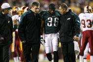 LANDOVER, MD - OCTOBER 26: Brian Westbrook #36 of the Philadelphia Eagles is escorted off the field after getting hit during the first quarter of the game against the Washington Redskins at FedEx Field October 26, 2009 in Landover, Maryland. (Photo by Win McNamee/Getty Images)