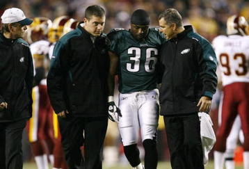 LANDOVER, MD - OCTOBER 26:  Brian Westbrook #36 of the Philadelphia Eagles is escorted off the field after getting hit during the first quarter of the game against the Washington Redskins at FedEx Field October 26, 2009 in Landover, Maryland. (Photo by Win McNamee/Getty Images)