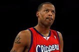 LOS ANGELES, CA - JANUARY 15:  Marcus Camby #23 of the Los Angeles Clippers stands on the court during the game against the Los Angeles Lakers on January 15, 2010 at Staples Center in Los Angeles, California.  The Lakers won 126-86.  NOTE TO USER: User expressly acknowledges and agrees that, by downloading and/or using this Photograph, user is consenting to the terms and conditions of the Getty Images License Agreement.  (Photo by Stephen Dunn/Getty Images)