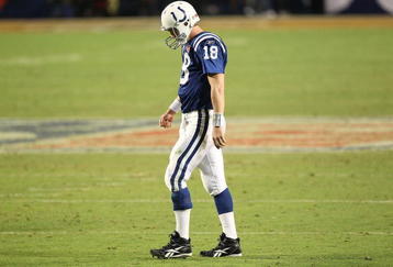 MIAMI GARDENS, FL - FEBRUARY 07: Peyton Manning #18 of the Indianapolis Colts walks on the field against the New Orleans Saints during Super Bowl XLIV on February 7, 2010 at Sun Life Stadium in Miami Gardens, Florida. (Photo by Jed Jacobsohn/Getty Images)
