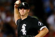 BOSTON - AUGUST 26:  Starting pitcher Gavin Floyd #34 of the Chicago White Sox throws to first base during the sixth inning during the game against the Boston Red Sox on August 26, 2009 at Fenway Park in Boston, Massachusetts. (Photo by: Elsa/Getty Images)
