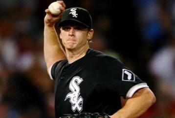 BOSTON - AUGUST 26:  Starting pitcher Gavin Floyd #34 of the Chicago White Sox throws to first base during the sixth inning during the game against the Boston Red Sox on August 26, 2009 at Fenway Park in Boston, Massachusetts. (Photo by: Elsa/Getty Images)