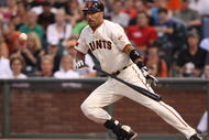 SAN FRANCISCO - AUGUST 28:  Randy Winn #2 of the San Francisco Giants lays down a sacrafice bunt in the first inning against the Colorado Rockies during a Major League Baseball game at AT&T Park on August 28, 2009 in San Francisco, California.  (Photo by Jed Jacobsohn/Getty Images)
