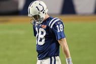 MIAMI GARDENS, FL - FEBRUARY 07:  Peyton Manning #18 of the Indianapolis Colts walks on the field against the New Orleans Saints during Super Bowl XLIV on February 7, 2010 at Sun Life Stadium in Miami Gardens, Florida.  (Photo by Jed Jacobsohn/Getty Images)