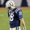 MIAMI GARDENS, FL - FEBRUARY 07:  Peyton Manning #18 of the Indianapolis Colts walks on the field against the New Orleans Saints during Super Bowl XLIV on February 7, 2010 at Sun Life Stadium in Miami Gardens, Florida.  (Photo by Jed Jacobsohn/Getty Images)