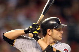 PHOENIX - JULY 23:  Freddy Sanchez #12 of the Pittsburgh Pirates bats against the Arizona Diamondbacks during the major league baseball game at Chase Field on July 23, 2009 in Phoenix, Arizona. The Diamondbacks defeated the Pirates 11-4. (Photo by Christian Petersen/Getty Images)