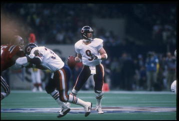 26 Jan 1986: Quarterback Jim McMahon of the Chicago Bears looks to pass the ball against the New England Patriots during Super Bowl XX at the Superdome in New Orleans, Louisiana. The Bears won the game, 46-10.