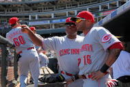 DENVER - SEPTEMBER 07: Darnell McDonald #16 of the Cincinnati Reds recieves instruction from coach Billy Hatcher #22 against the Colorado Rockies at Coors Field on September 7, 2009 in Denver, Colorado. The Rockies defeated the Reds 4-3. (Photo by Doug Pensinger/Getty Images)