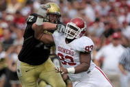 BOULDER, CO - SEPTEMBER 29:  Devin Head #93 of the Colorado Buffaloes block Gerald McCoy #93 of the Oklahoma Sooners at Folsom Field on September 29, 2007 in Boulder, Colorado. Colorado defeated Oklahoma 27-24.  (Photo by Doug Pensinger/Getty Images)