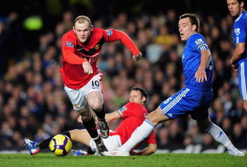 LONDON, ENGLAND - NOVEMBER 08:  Wayne Rooney of Manchester United goes past the challenge from John Terry of Chelsea during the Barclays Premier League match between Chelsea and Manchester United at Stamford Bridge on November 8, 2009 in London, England.  (Photo by Clive Mason/Getty Images)
