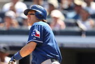 NEW YORK - AUGUST 27:  Ian Kinsler  #5 of the Texas Rangers hits a three run homerun in the fourth inning against the New York Yankees during the MLB game on August 27, 2009 at Yankees Stadium in the Bronx borough of New York City. (Photo by Al Bello/Getty Images)