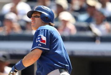 NEW YORK - AUGUST 27:  Ian Kinsler  #5 of the Texas Rangers hits a three run homerun in the fourth inning against the New York Yankees during the MLB game on August 27, 2009 at Yankees Stadium in the Bronx borough of New York City. (Photo by Al Bello/Getty Images)