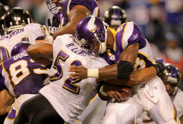 MINNEAPOLIS - OCTOBER 18:  Linebacker Ray Lewis #52 of the Baltimore Ravens makes a tackle on running back Adrian Peterson #28 of the Minnesota Vikings on first and goal from the two in the fourth quarter during NFL action at Hubert H. Humphrey Metrodome on October 18, 2009 in Minneapolis, Minnesota. The Vikings defeated the Ravens 33-31.  (Photo by Doug Pensinger/Getty Images)