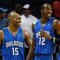 CHARLOTTE, NC - NOVEMBER 10:  Teammates Vince Carter #15 and Dwight Howard #12 of the Orlando Magic look over at the bench of the Charlotte Bobcats during their game at Time Warner Cable Arena on November 10, 2009 in Charlotte, North Carolina.  (Photo by Streeter Lecka/Getty Images)