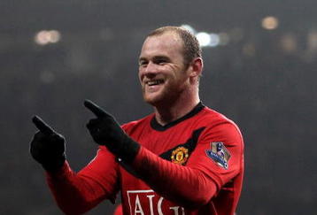 MANCHESTER, ENGLAND - JANUARY 23:  Wayne Rooney of Manchester United celebrates scoring his hat-trick during the Barclays Premier League match between Manchester United and Hull City at Old Trafford on January 23, 2010 in Manchester, England.  (Photo by Julian Finney/Getty Images)