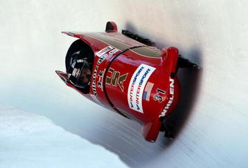 ST MORITZ, SWITZERLAND - JANUARY 17:  USA 3 driven by Mike Kohn in action during the four man FIBT Bobsliegh World Cup round 7 race at the Olympia Bobrun on January 17, 2010 in St Moritz, Switzerland.  (Photo by Richard Heathcote/Getty Images)