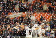 MIAMI GARDENS, FL - FEBRUARY 07: Drew Brees #9 of the New Orleans Saints celebrates after defeating the Indianapolis Colts during Super Bowl XLIV on February 7, 2010 at Sun Life Stadium in Miami Gardens, Florida. (Photo by Jed Jacobsohn/Getty Images)