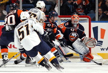 UNIONDALE, NY - FEBRUARY 09:  Martin Biron #43 of the New York Islanders makes a save against the Nashville Predators on February 9, 2010 at Nassau Coliseum in Uniondale, New York.  (Photo by Jim McIsaac/Getty Images)