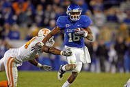 LEXINGTON, KY - NOVEMBER 28: Randall Cobb #18 of the Kentucky Wildcats runs with the ball against the Tennessee Volunteers during the SEC game at Commonwealth Stadium on November 28, 2009 in Lexington, Kentucky. (Photo by Andy Lyons/Getty Images)