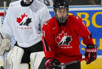 LONDON,ON - JANUARY 3:  Zach Kassian #10 of Team Ontario stations himself in front of Matthew Krahn #1 of Team West in a game on January 3, 2008 at the John Labatt Centre in London, Ontario. Team Ontario defeated Team West 4-3 to earn a spot in the gold medal game at the World Under 17 Challenge. (Photo by Claus Andersen/Getty Images)