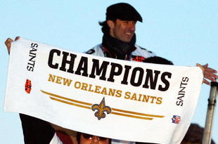 NEW ORLEANS - FEBRUARY 09:  Nick Leckey #60 and Quarterback Drew Brees #9 of the New Orleans Saints celebrate as they parade though the city after winning Super Bowl XLIV on February 9, 2010 in New Orleans, Louisiana.  (Photo by Sean Gardner/Getty Images)