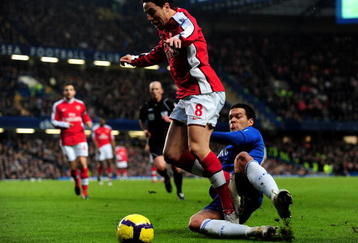 LONDON, ENGLAND - FEBRUARY 07:  Michael Ballack of Chelsea tackles Samir Nasri of Arsenal during the Barclays Premier League match between Chelsea and Arsenal at Stamford Bridge on February 7, 2010 in London, England.  (Photo by Mike Hewitt/Getty Images)