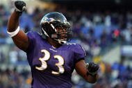 BALTIMORE - NOVEMBER 23:  LeRon McClain #33 of the Baltimore Ravens celebrates his touchdown against the Philadelphia Eagles on November 23, 2008 at M&T Bank Stadium in Baltimore, Maryland. The Ravens defeated the Eagles 36-7.  (Photo by Jim McIsaac/Getty Images)