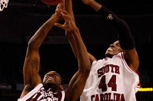 TAMPA, FL - MARCH 13:  Brian Johnson #44 of the Mississippi State Bulldogs fights for a rebound with Sam Muldrow #44 of the South Carolina Gamecocks during the quaterfinal round of the SEC Men's Basketball Tournament on March 13, 2009 at The St. Pete Times Forum in Tampa, Florida.  (Photo by Chris Graythen/Getty Images)