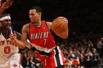 NEW YORK - DECEMBER 07:  Brandon Roy #7 of the Portland Trail Blazers drives to the basket against Larry Hughes #0 of the New York Knicks at Madison Square Garden on December 7, 2009 in New York, New York. NOTE TO USER: User expressly acknowledges and agrees that, by downloading and/or using this Photograph, user is consenting to the terms and conditions of the Getty Images License Agreement.  (Photo by Nick Laham/Getty Images)
