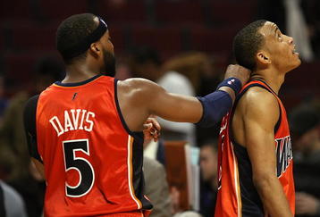CHICAGO - JANUARY 18:  Baron Davis #5 and Monta Ellis #8 of the Golden State Warriors talk during the NBA game against the Chicago Bulls on January 18, 2008 at the United Center in Chicago, Illinois.  The Warriors won 119-111.  NOTE TO USER: User expressly acknowledges and agreees that, by downloading and/or using this Photograph, User is consenting to the terms and conditions of the Getty Images License Agreement. (Photo by Jonathan Daniel/Getty Images)