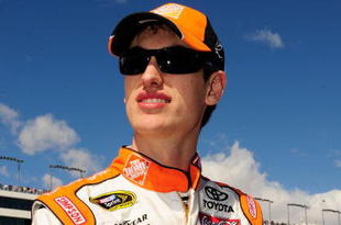 LAS VEGAS - FEBRUARY 28:  Joey Logano, driver of the #20 Home Depot Toyota, stands on the grid prior to the start of the NASCAR Sprint Cup Series Shelby American at Las Vegas Motor Speedway on February 28, 2010 in Las Vegas, Nevada.  (Photo by Rusty Jarrett/Getty Images for NASCAR)
