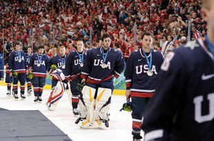 VANCOUVER, BC - FEBRUARY 28:  Goaltender Ryan Miller #39 of USA skates off the ice after losing 3-2 in the first overtime of their ice hockey men's gold medal game against Canada on day 17 of the Vancouver 2010 Winter Olympics at Canada Hockey Place on February 28, 2010 in Vancouver, Canada.  (Photo by Harry How/Getty Images)